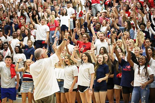 USA football coach talking to freshmen class